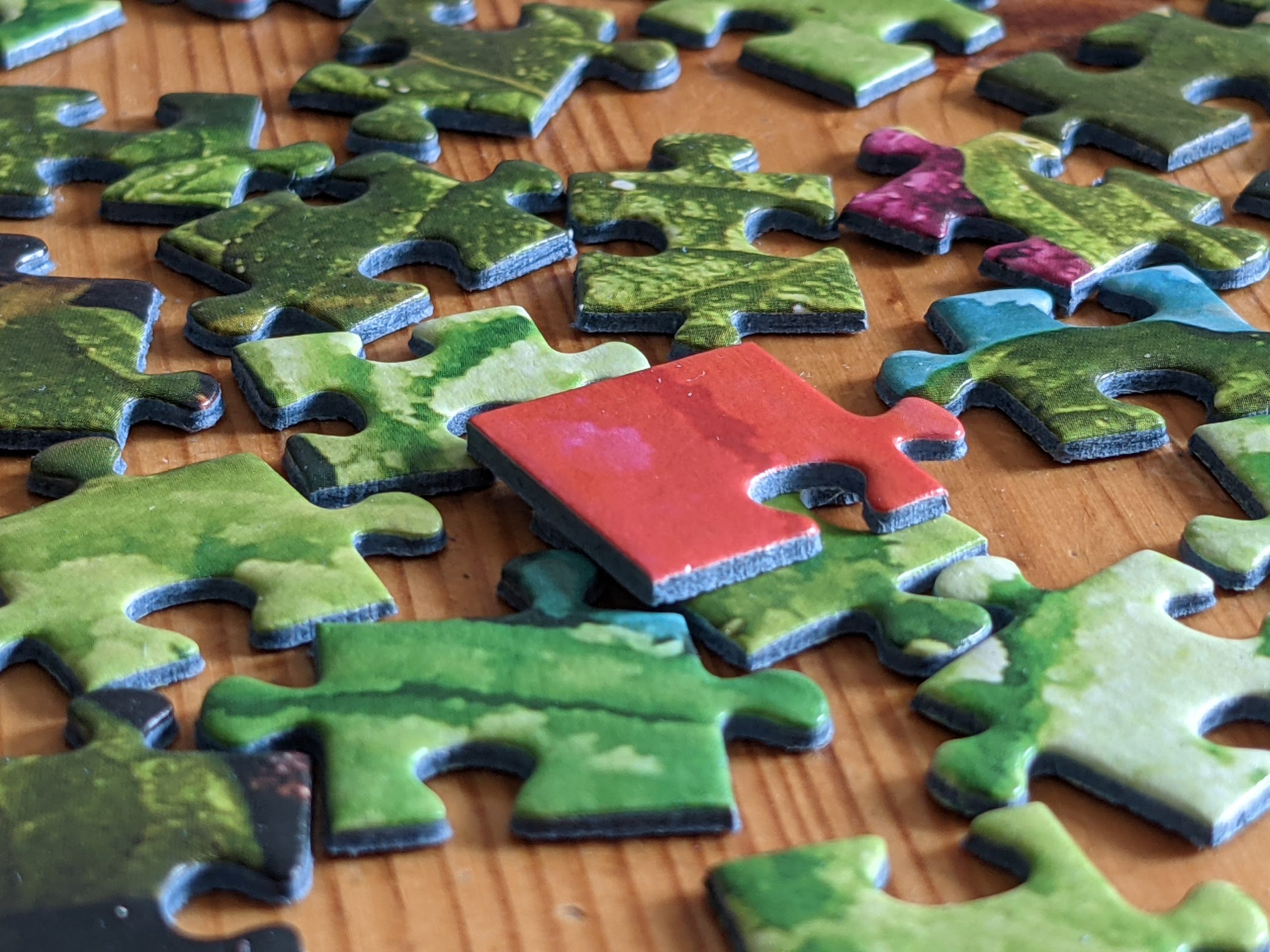 Precision die-cut daily jigsaw puzzle pieces fitting together cleanly